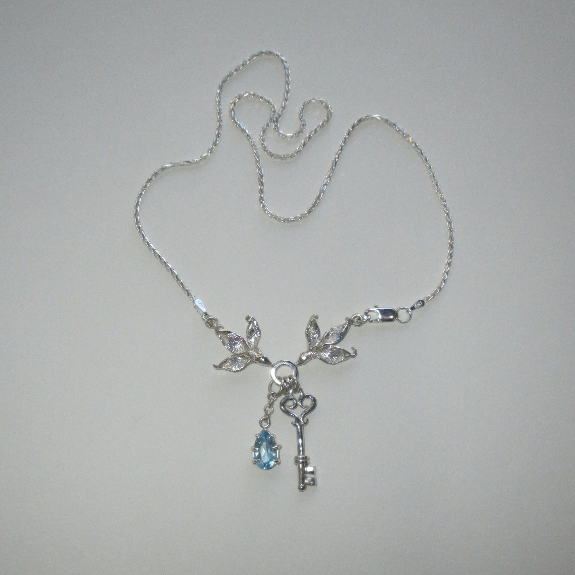 Two Birds One Stone Necklace