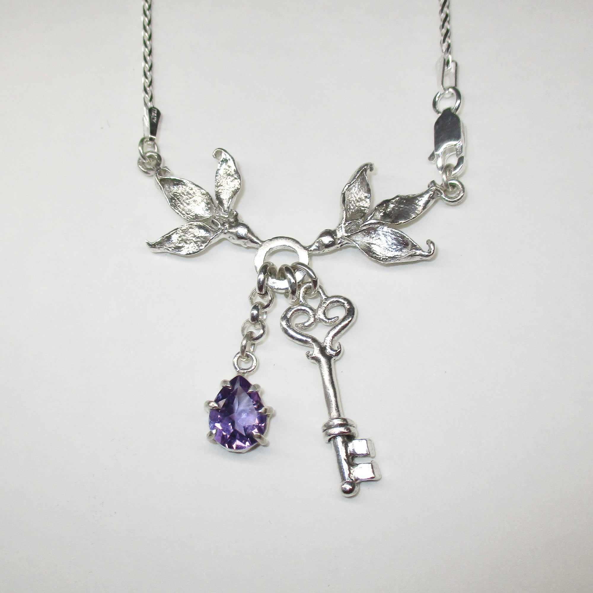 Two Birds One Stone Necklace