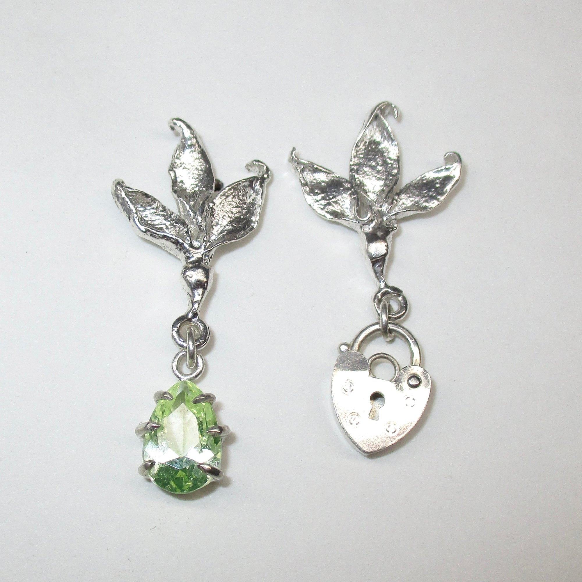 Two Birds One Stone Earrings in White Crystal